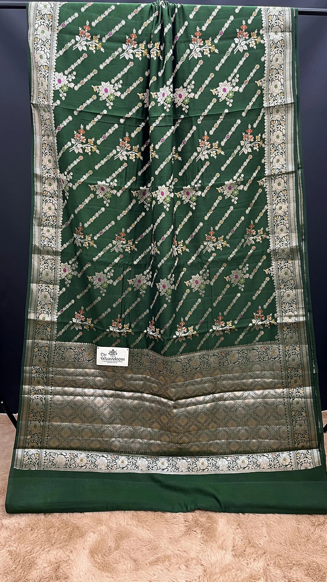 The Weaveloom Bottle Green Floral Meenakari Chiniya Silk Pure Banarasi Saree with Golden Zari Border and Rich Pallu