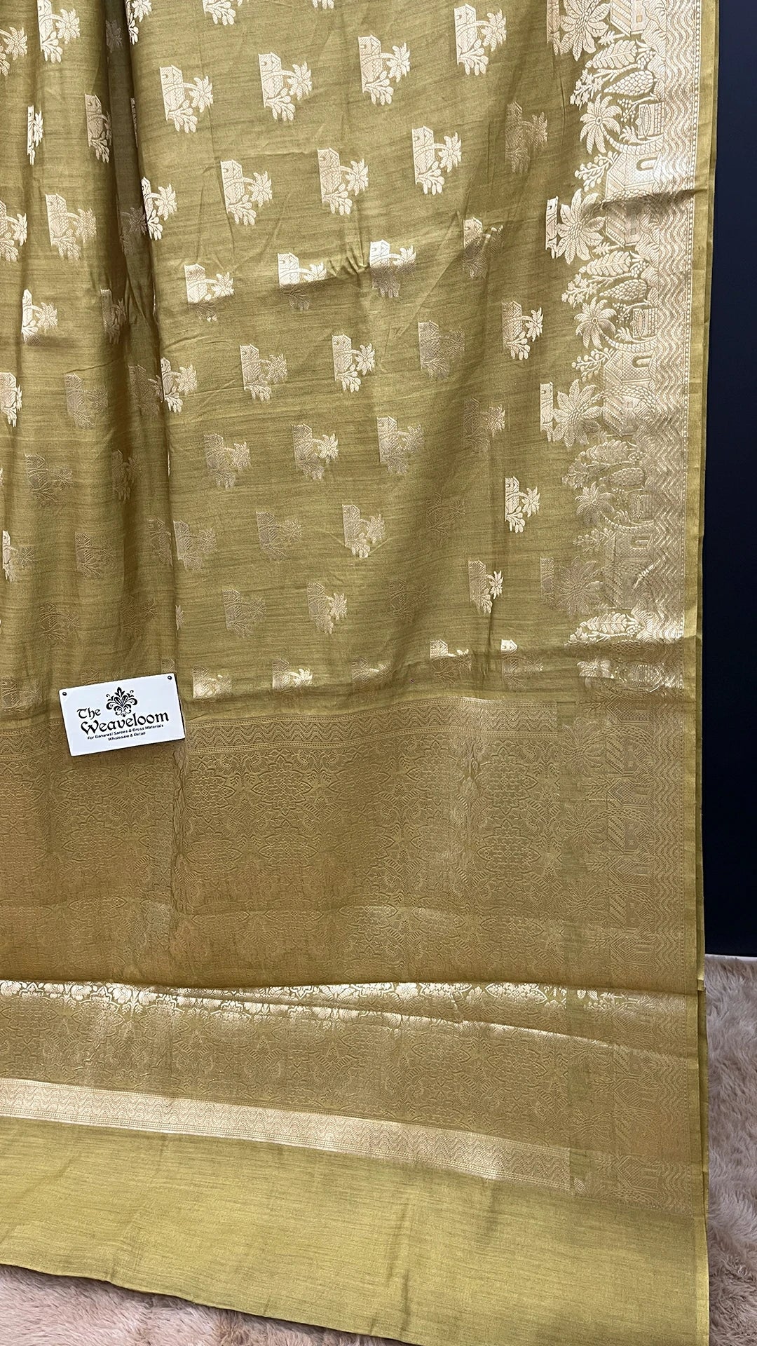 The Weaveloom Dhani Olive Golden Zari Chiniya Silk Pure Banarasi Saree with floral woven border and rich zari pallu