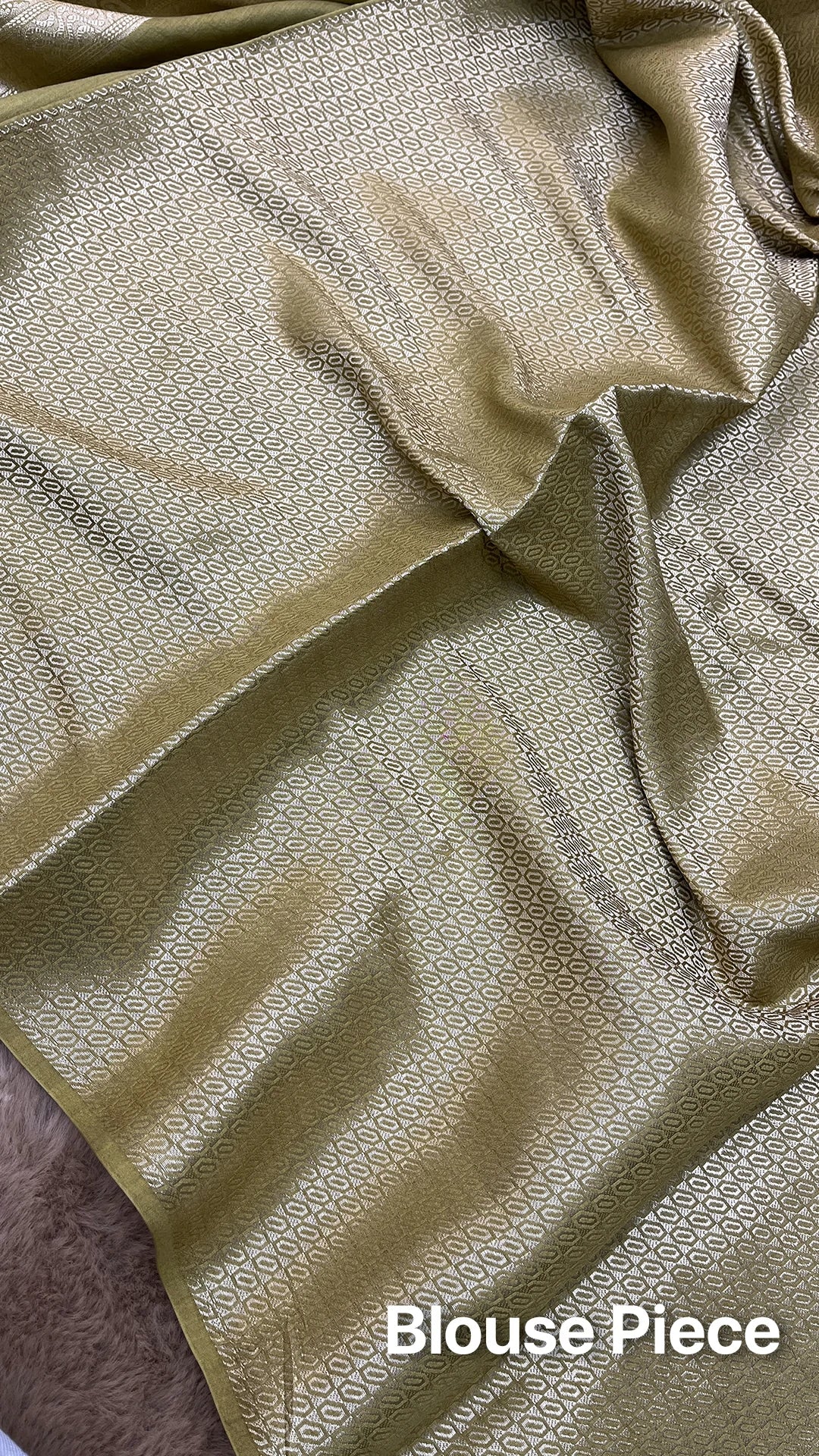The Weaveloom Dhani Olive Golden Zari Chiniya Silk Pure Banarasi Saree with floral woven border and rich zari pallu