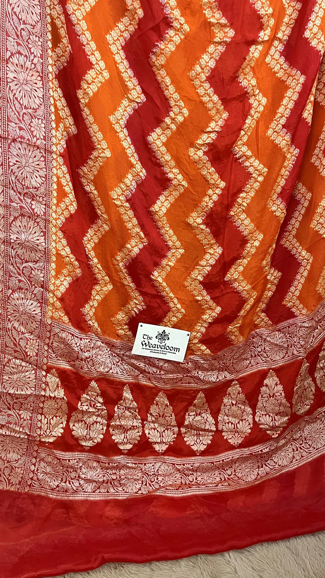 The Weaveloom Fanta Orange Red Rangkat Pattern Pure Crepe Georgette Banarasi Saree with Golden Zari