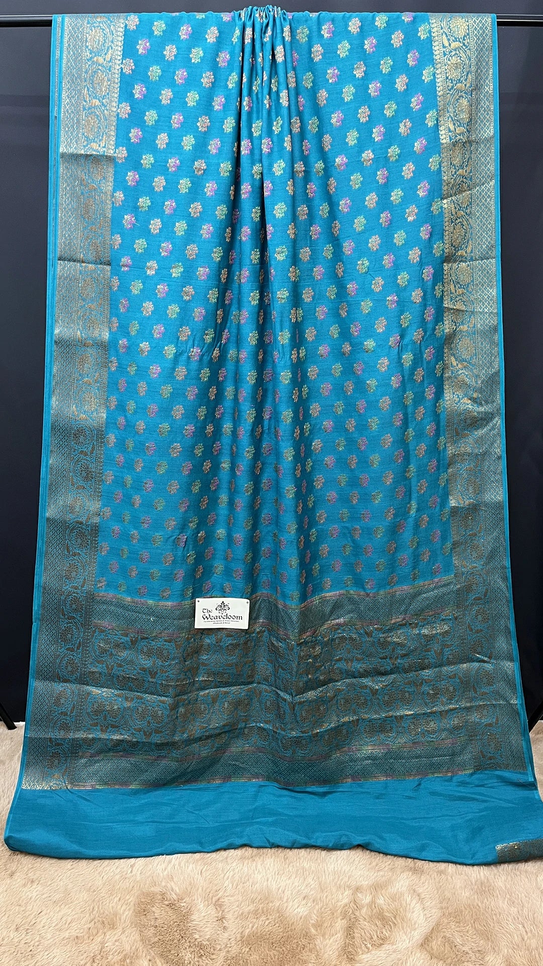 The Weaveloom Firozi Munga Silk Pure Banarasi Saree with Floral Meenakari Buti Antique Zari Border and Rich Pallu