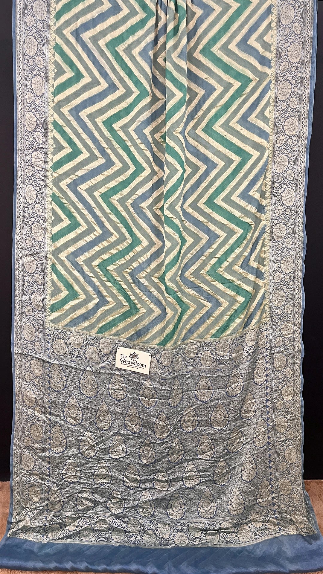 The Weaveloom Grey Blue Zigzag Rangkat Pattern Pure Crepe Georgette Golden Zari Banarasi Saree