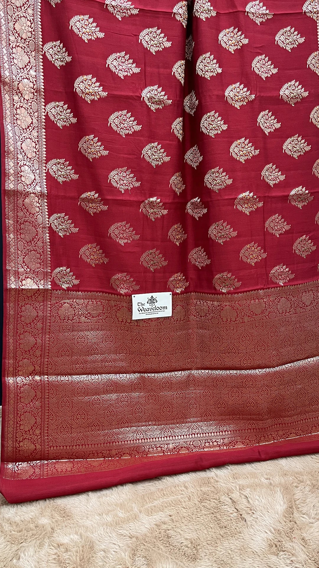 The Weaveloom Maroon Chiniya Silk Pure Banarasi Saree with Golden Meenakari Leaf Buti and Rich Zari Border