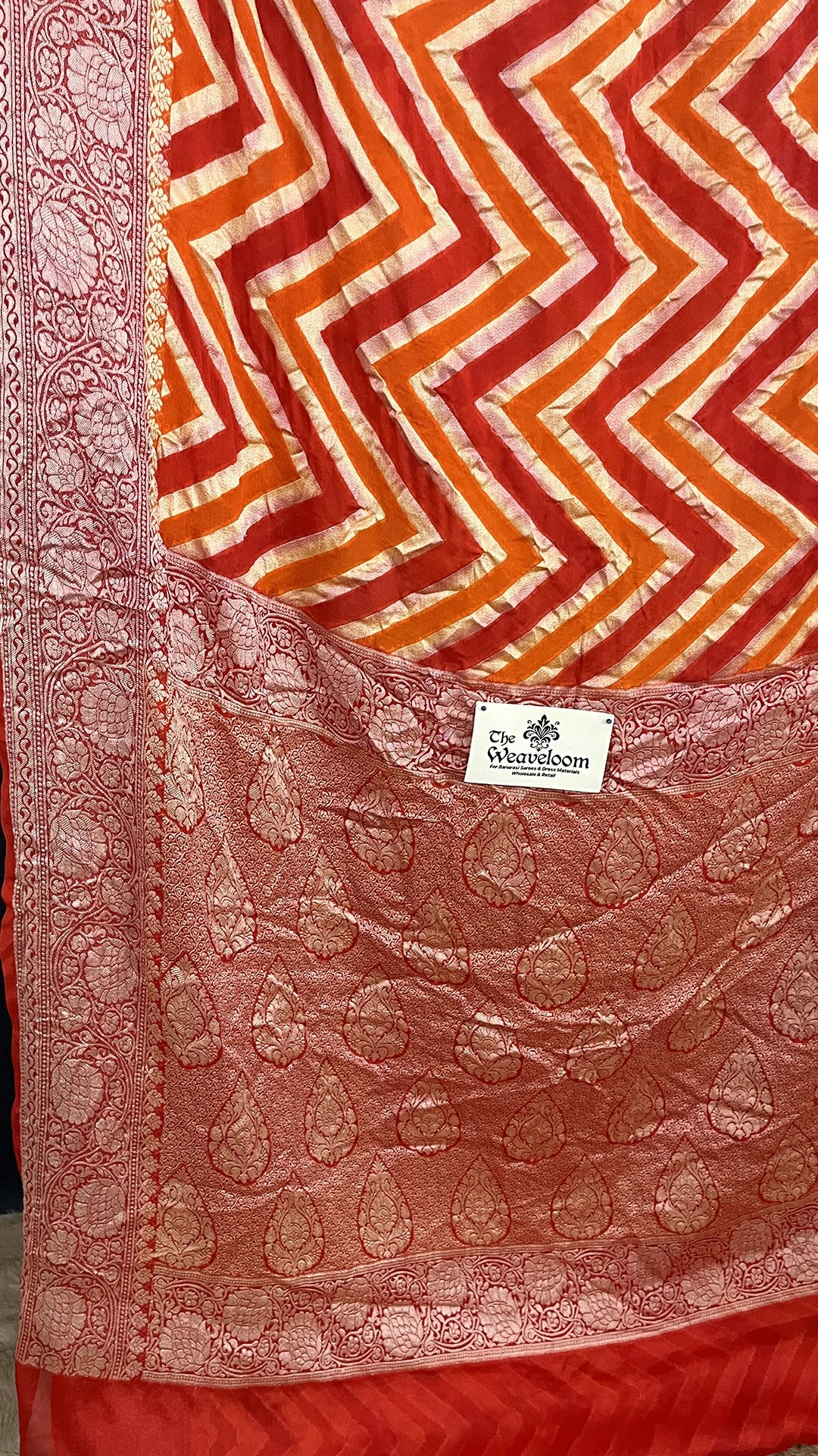 The Weaveloom Orange Fanta Rangkat Chevron Pattern Pure Crepe Georgette Multicolor Banarasi Saree with Golden Zari Border