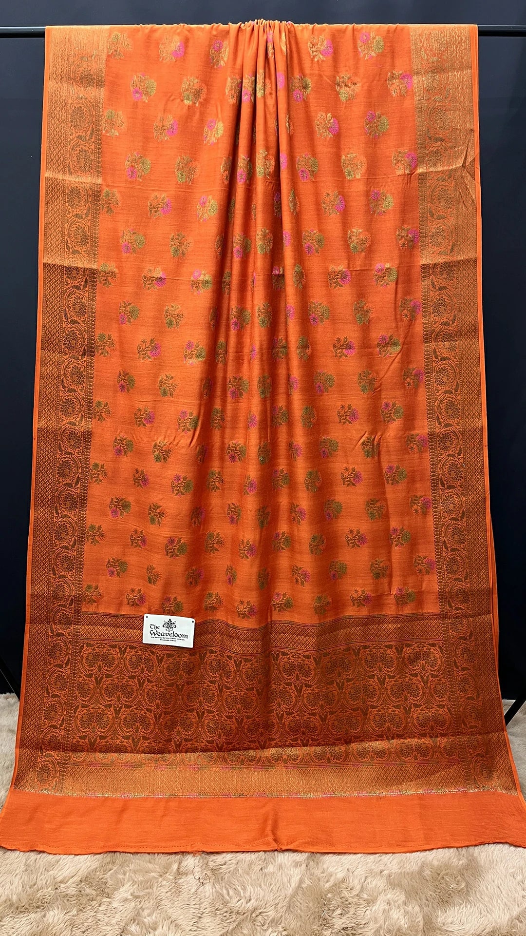 The Weaveloom Orange Floral Meenakari Pure Munga Silk Banarasi Saree with Antique Zari