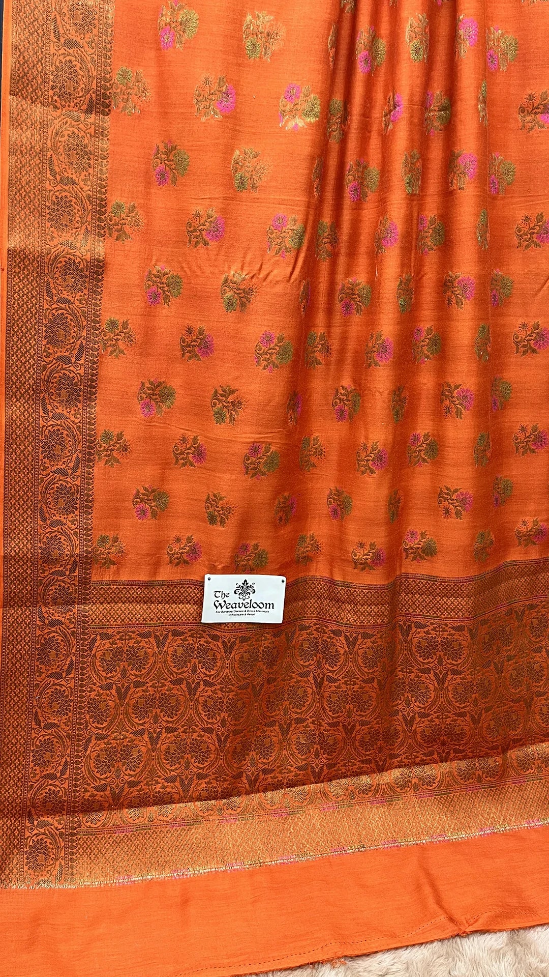 The Weaveloom Orange Floral Meenakari Pure Munga Silk Banarasi Saree with Antique Zari
