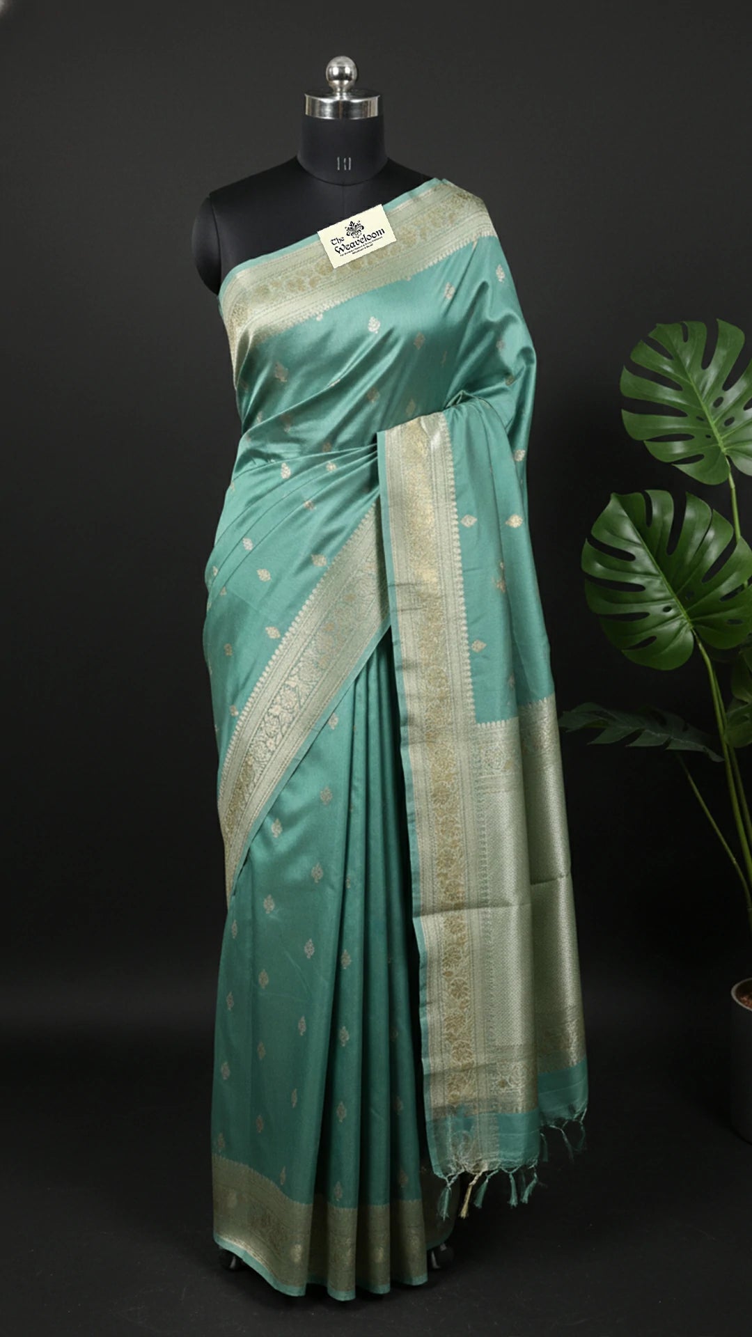 The Weaveloom pista green pure katan silk handloom Banarasi saree with silver zari kadwa border