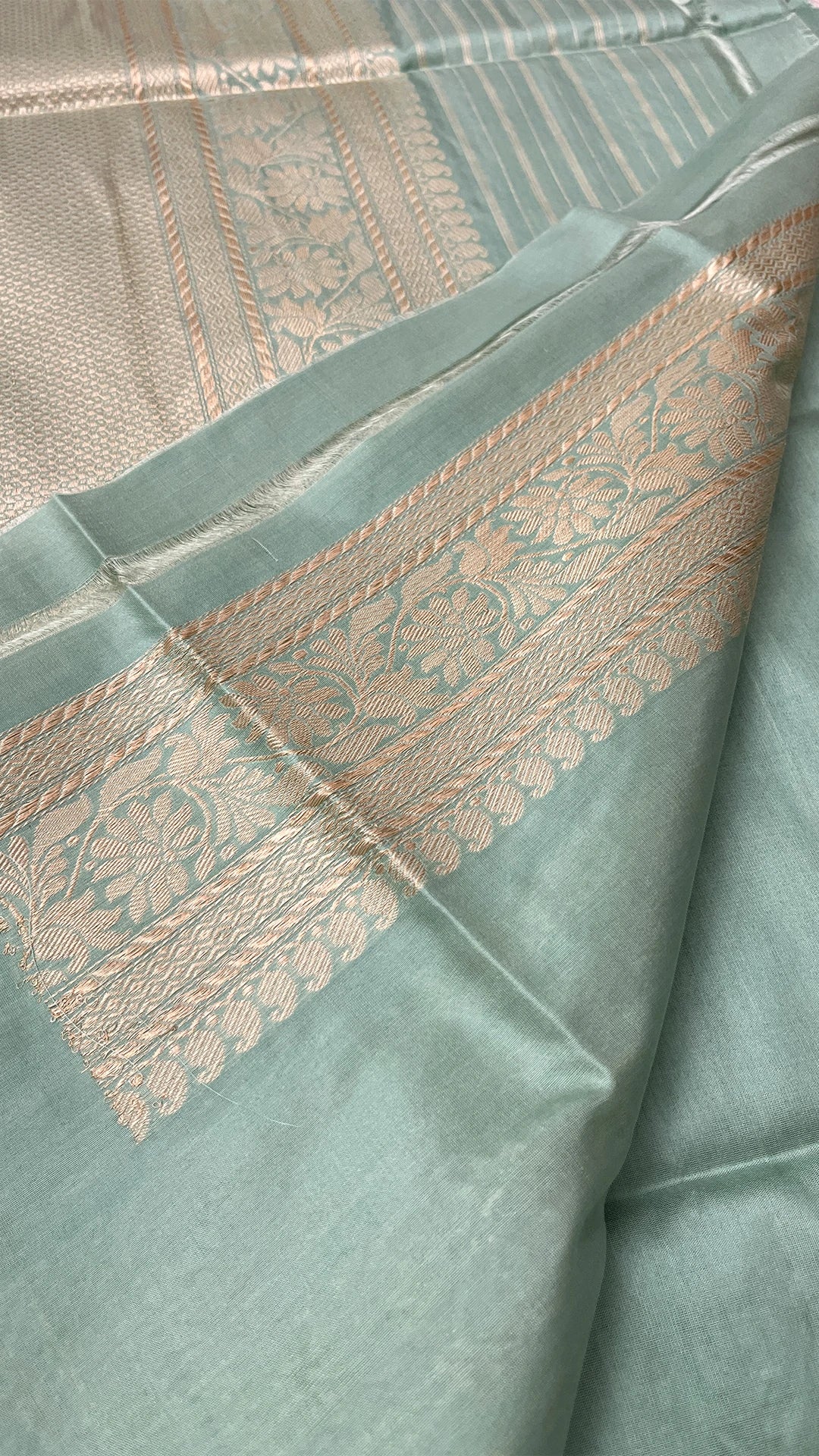 The Weaveloom pista green pure katan silk handloom Banarasi saree with silver zari kadwa border