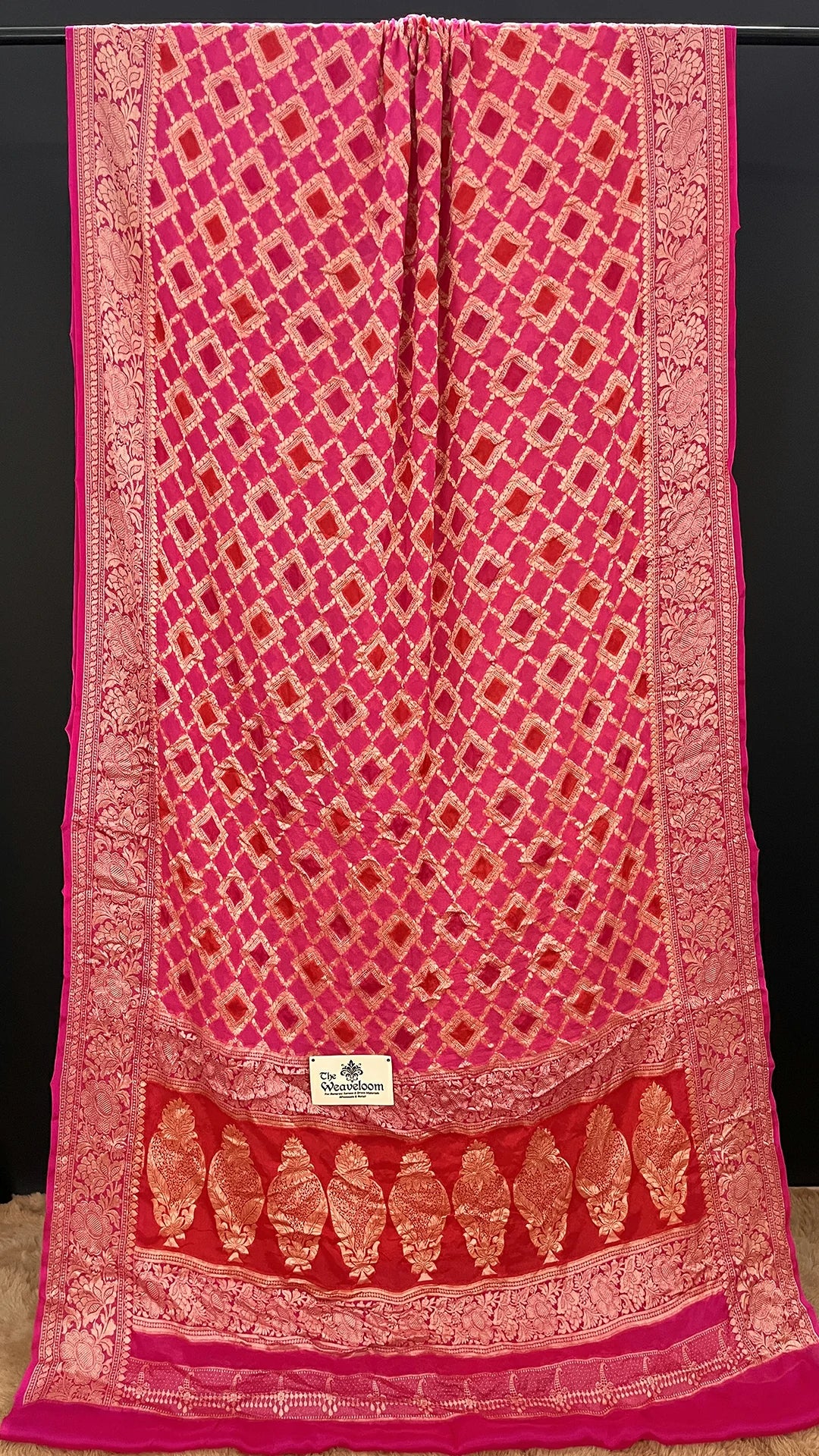 The Weaveloom Rani Pink Rangkat Jaal Pattern Pure Crepe Georgette Banarasi Saree with Golden Zari