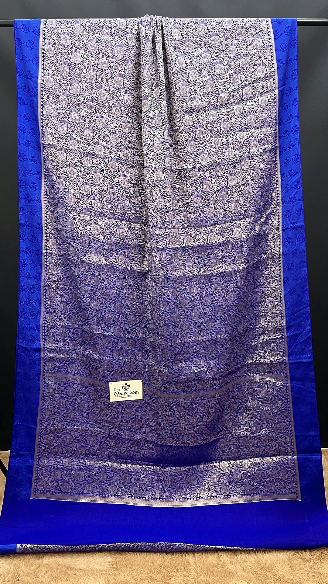 The Weaveloom Royal Blue Silver Brocade Floral Chiniya Silk Pure Banarasi Saree