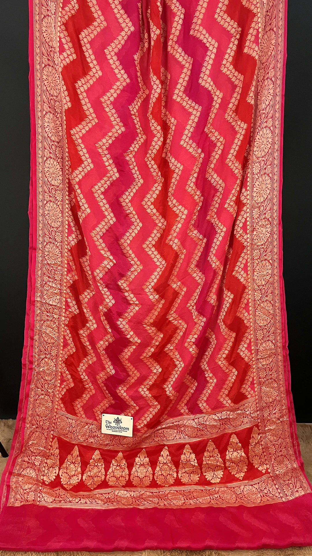 The Weaveloom Strawberry Rangkat Crepe Georgette Pure Banarasi Saree in Multicolor with Golden Zari Zigzag Pattern and Floral Border