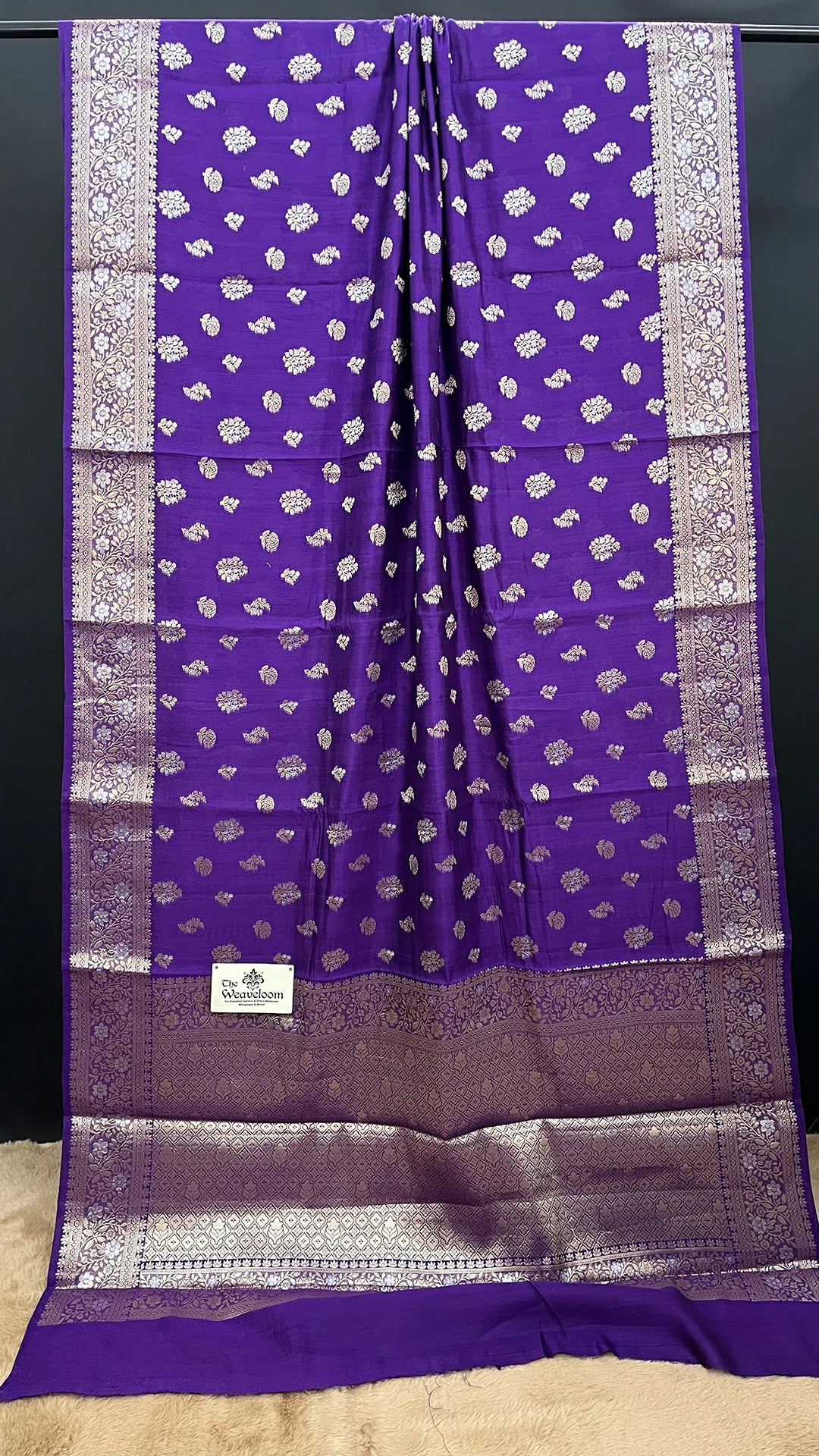 The Weaveloom violet chiniya silk pure banarasi saree with sona rupa zari floral buti and rich border