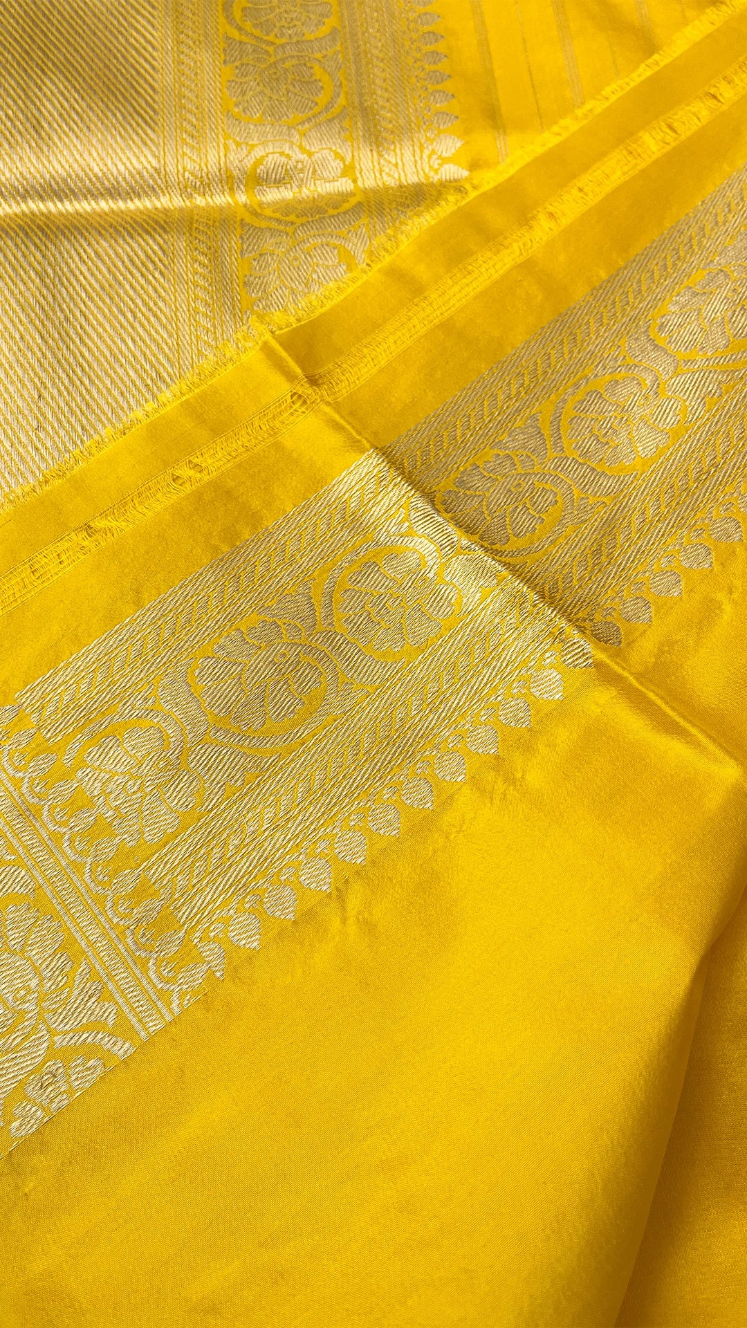 Yellow Pure Katan Silk Handloom Banarasi Saree with Chand Tara Buti and Silver Zari Border by The Weaveloom